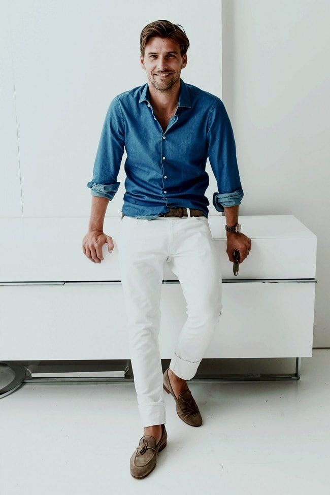 A Man Wearing White Jeans with Blue Denim Shirts